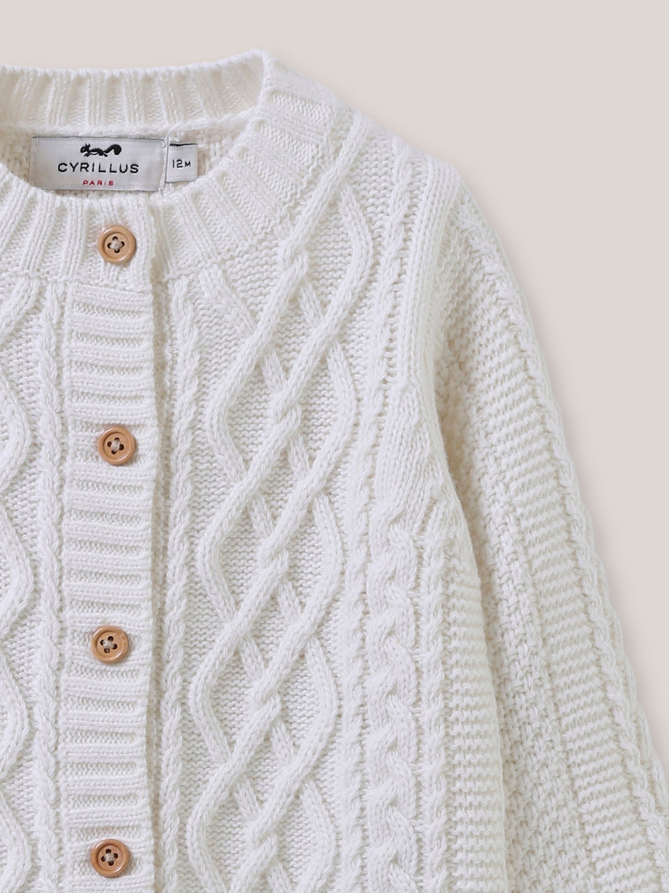Baby's cable-knit sweater
