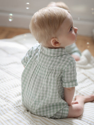 Baby's gingham check sleepsuit