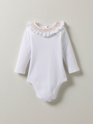 Baby's organic cotton bodysuit with smocked collar