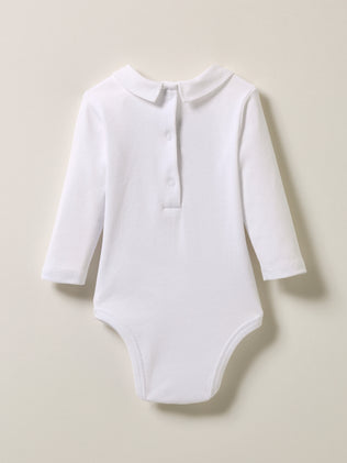 Baby's organic cotton bodusuit with embroidered collar