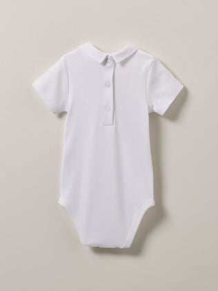 Baby's organic cotton embroidered bodysuit