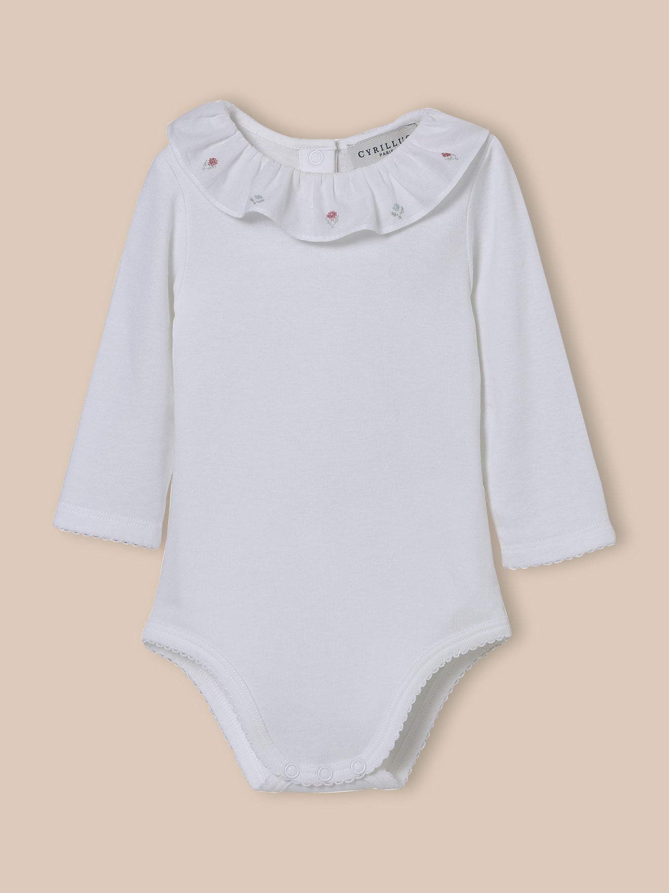 Baby's organic cotton bodysuit with embroidered neckline