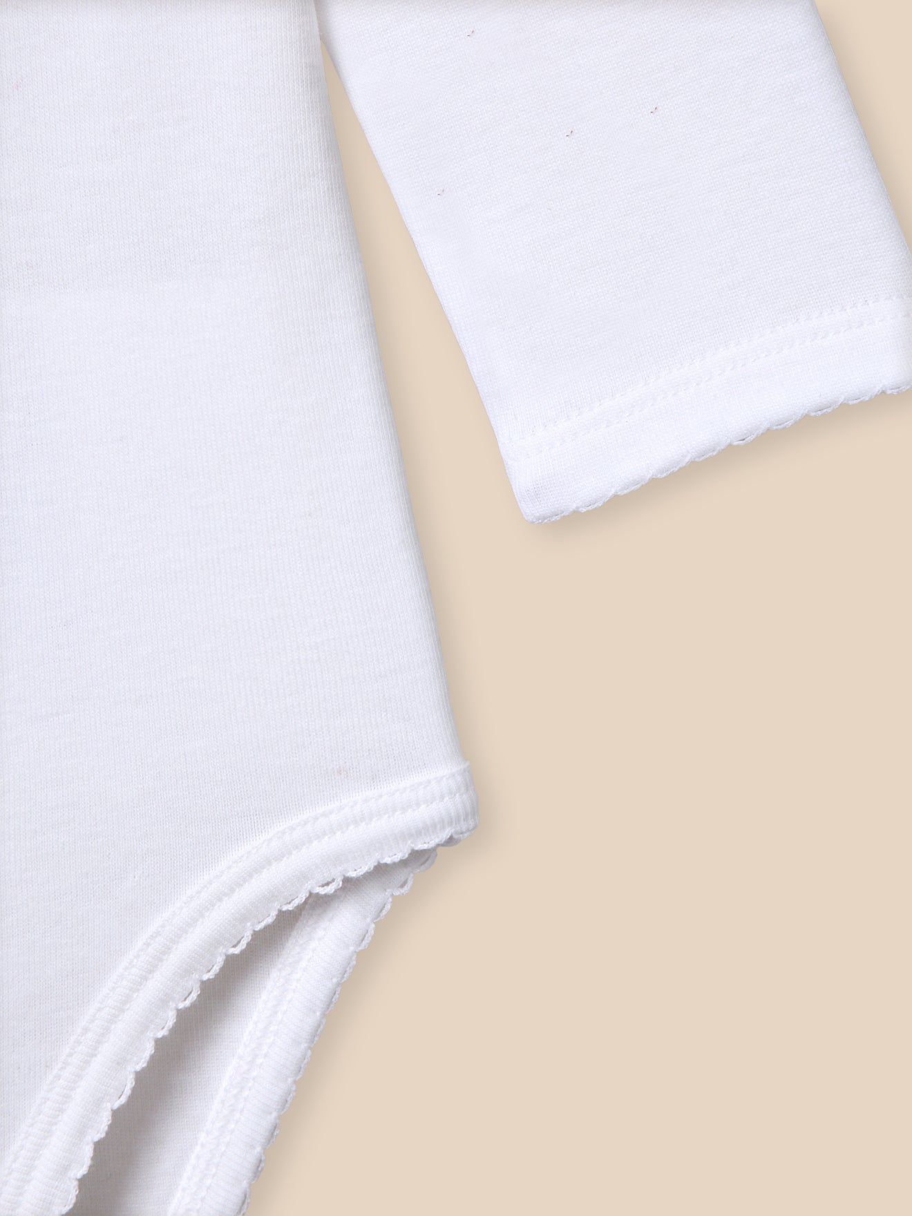 Baby bodysuit with broderie anglaise collar - Organic cotton