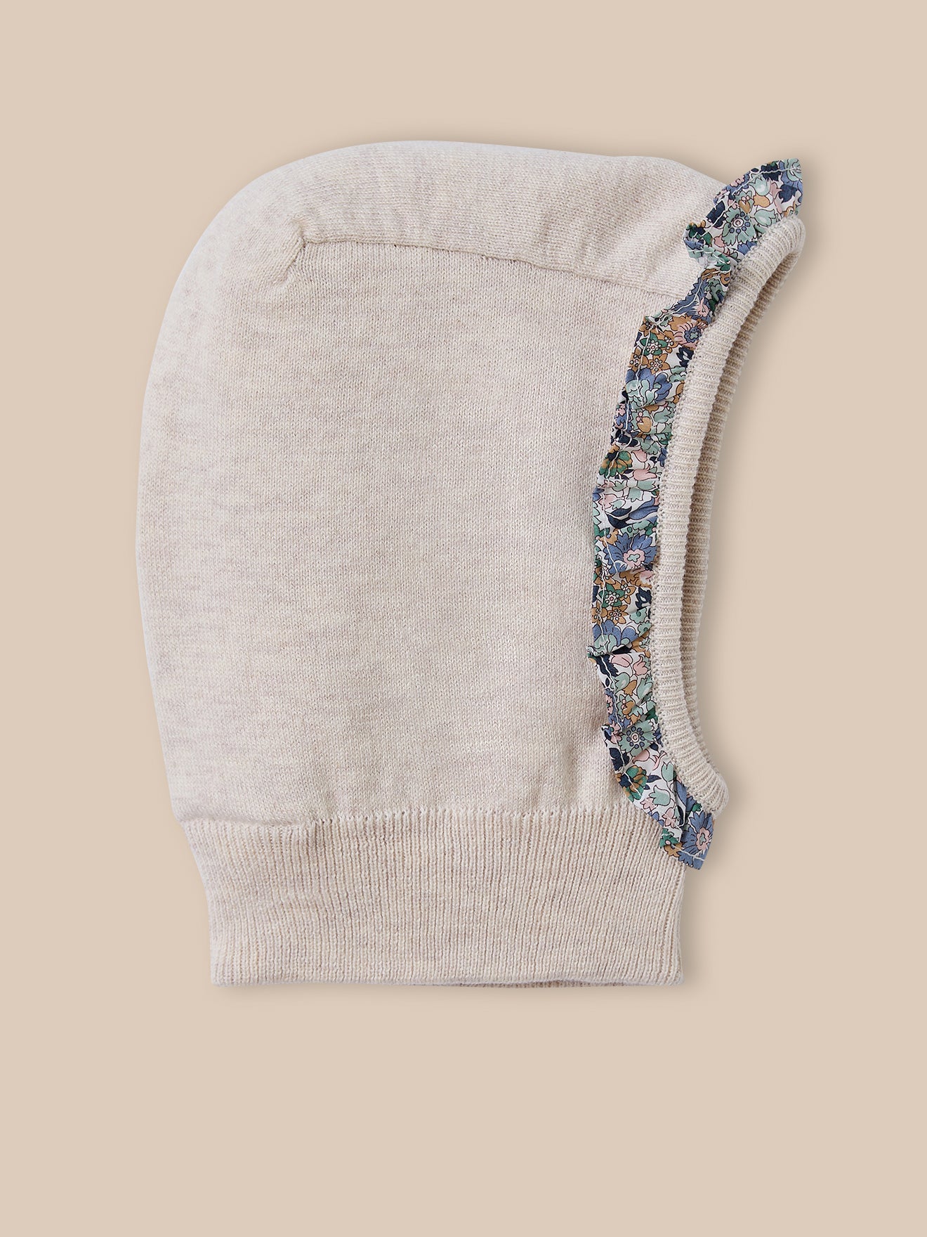 Baby's pullover hood trimmed with a flounce made with Liberty fabric