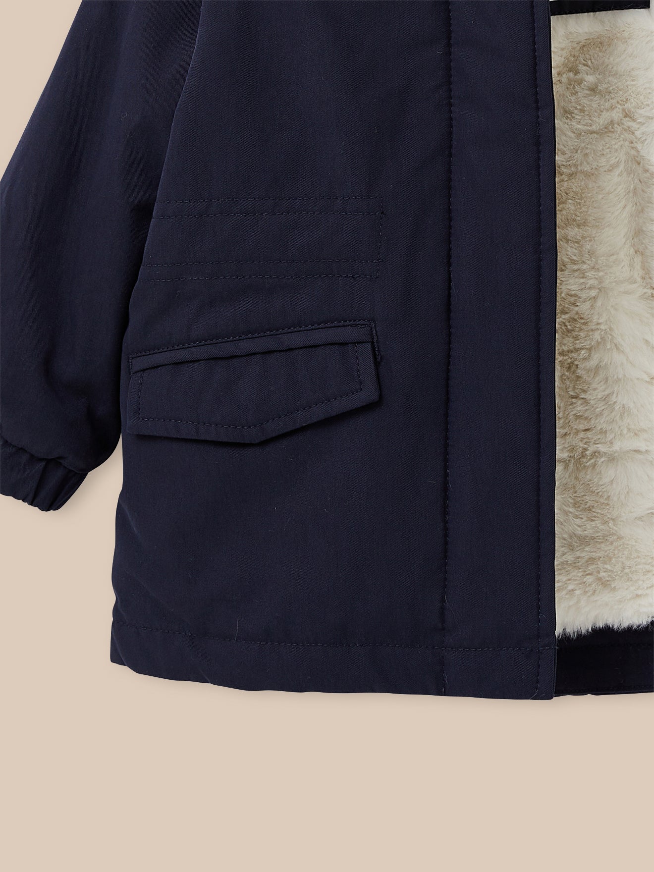 Baby's parka with faux-fur lining
