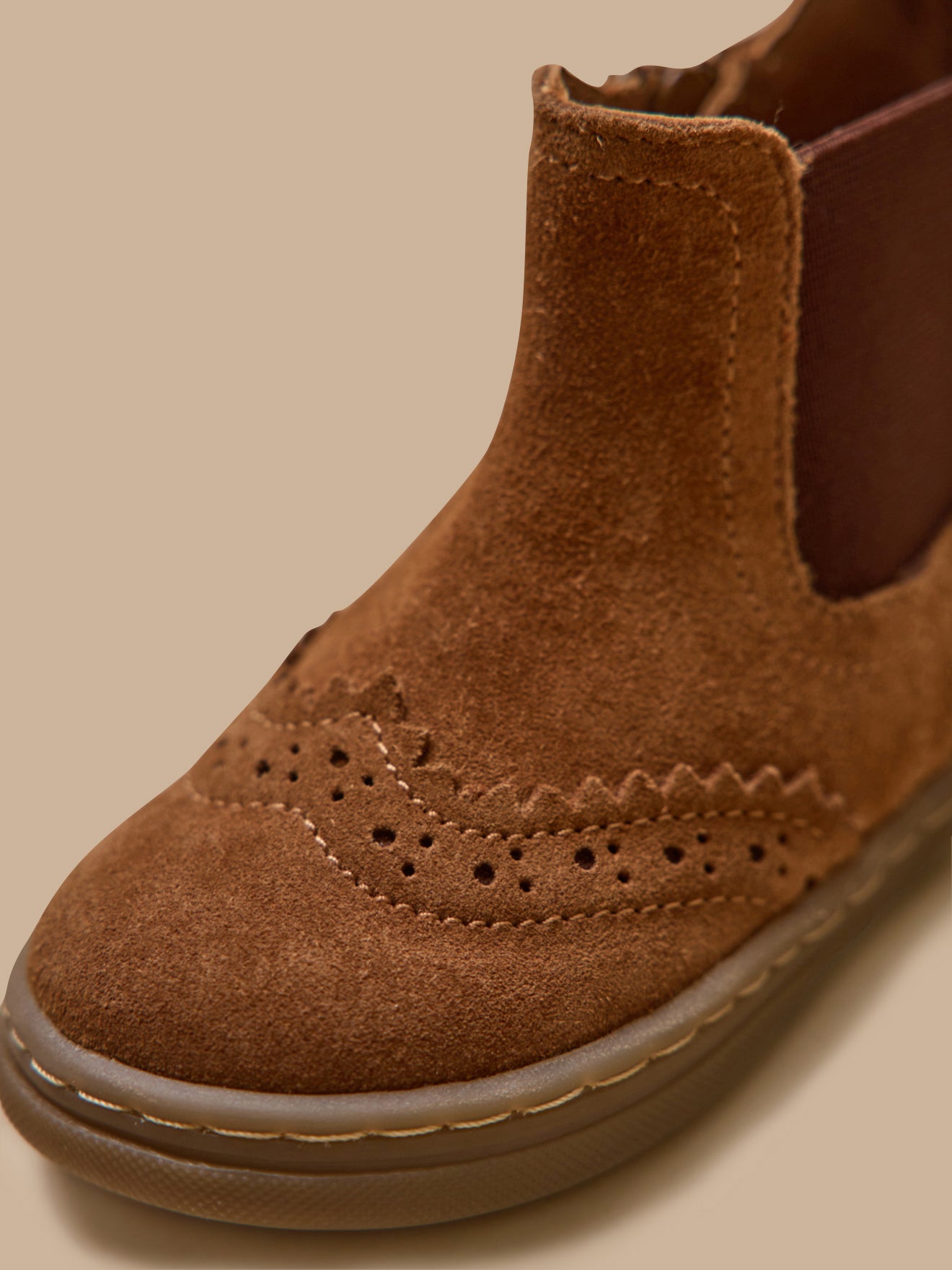 Baby's leather Chelsea boots with punch-hole toe