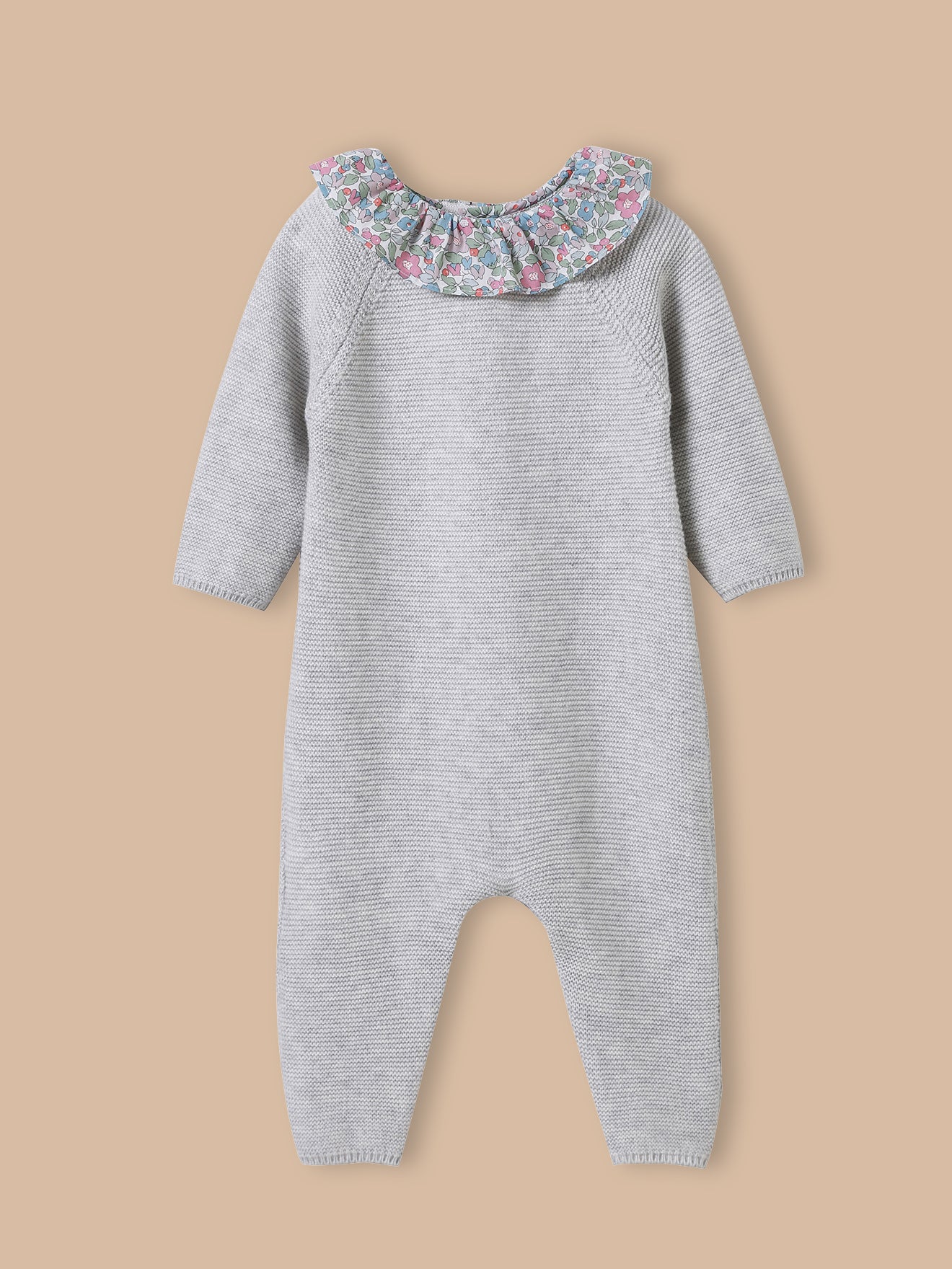Baby's knit jumpsuit, collar made with Liberty fabric