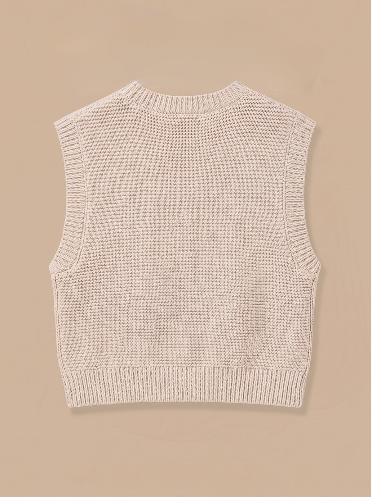 Girl's sleeveless cable-knit cardigan