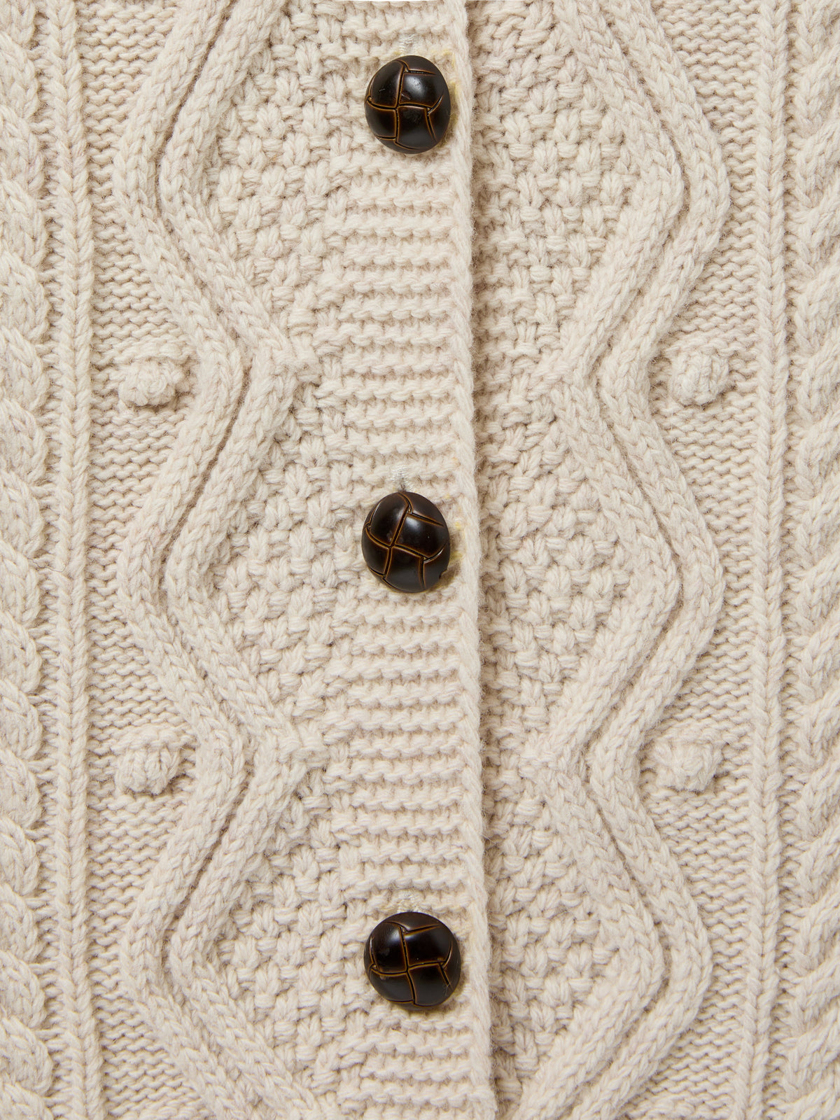 Girl's sleeveless cable-knit cardigan