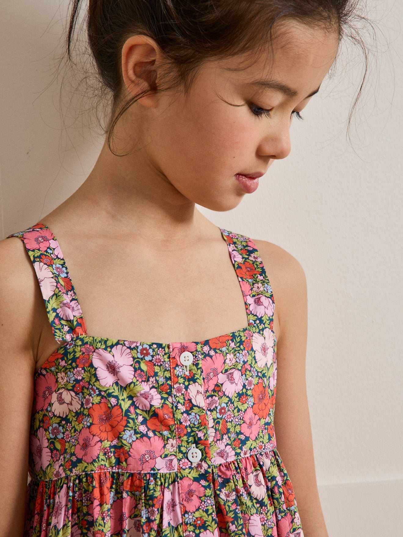 Girl's Meadow Song print dress made with Liberty fabric