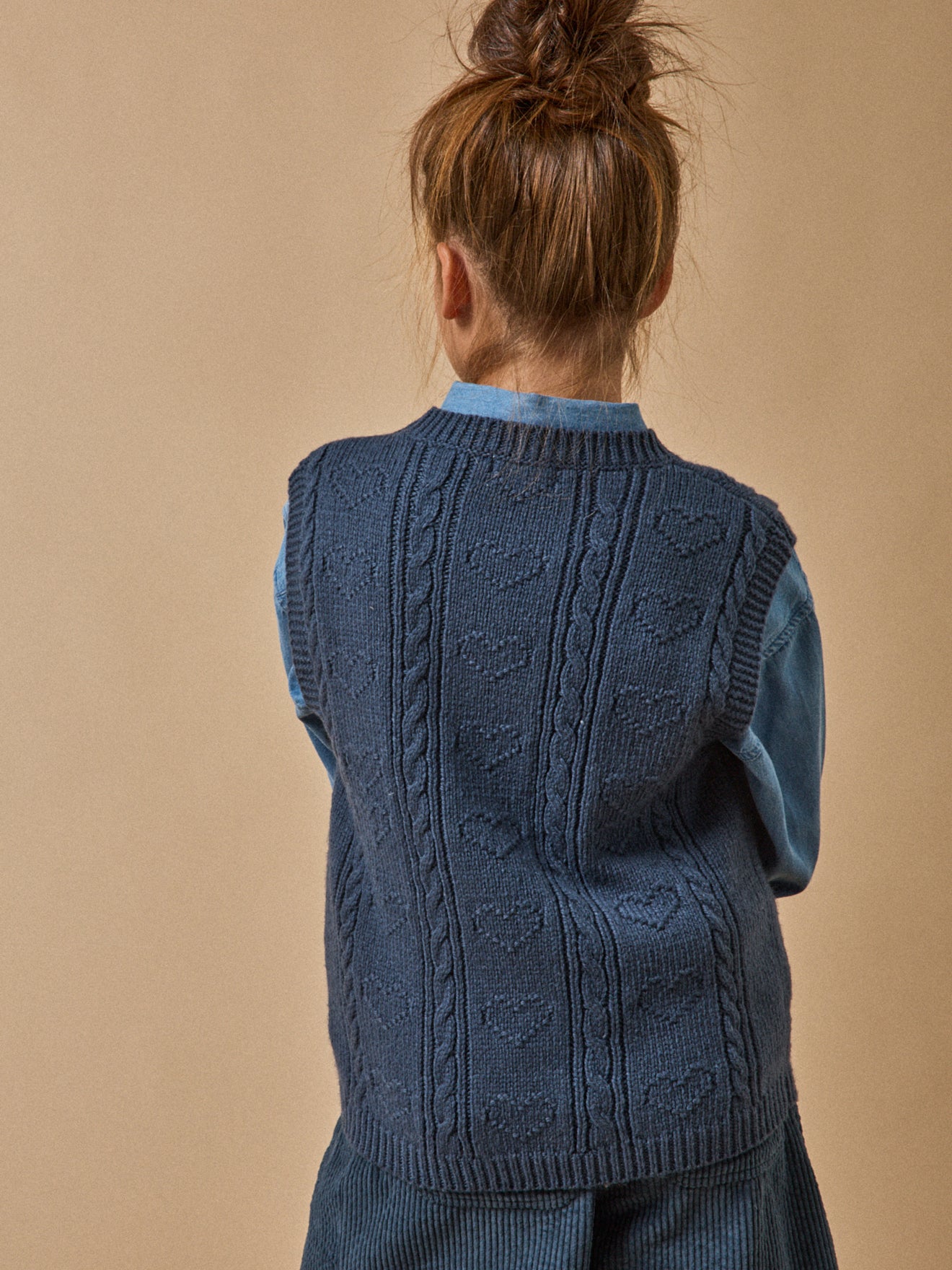 Girl's sleeveless sweater made with RWS* wool