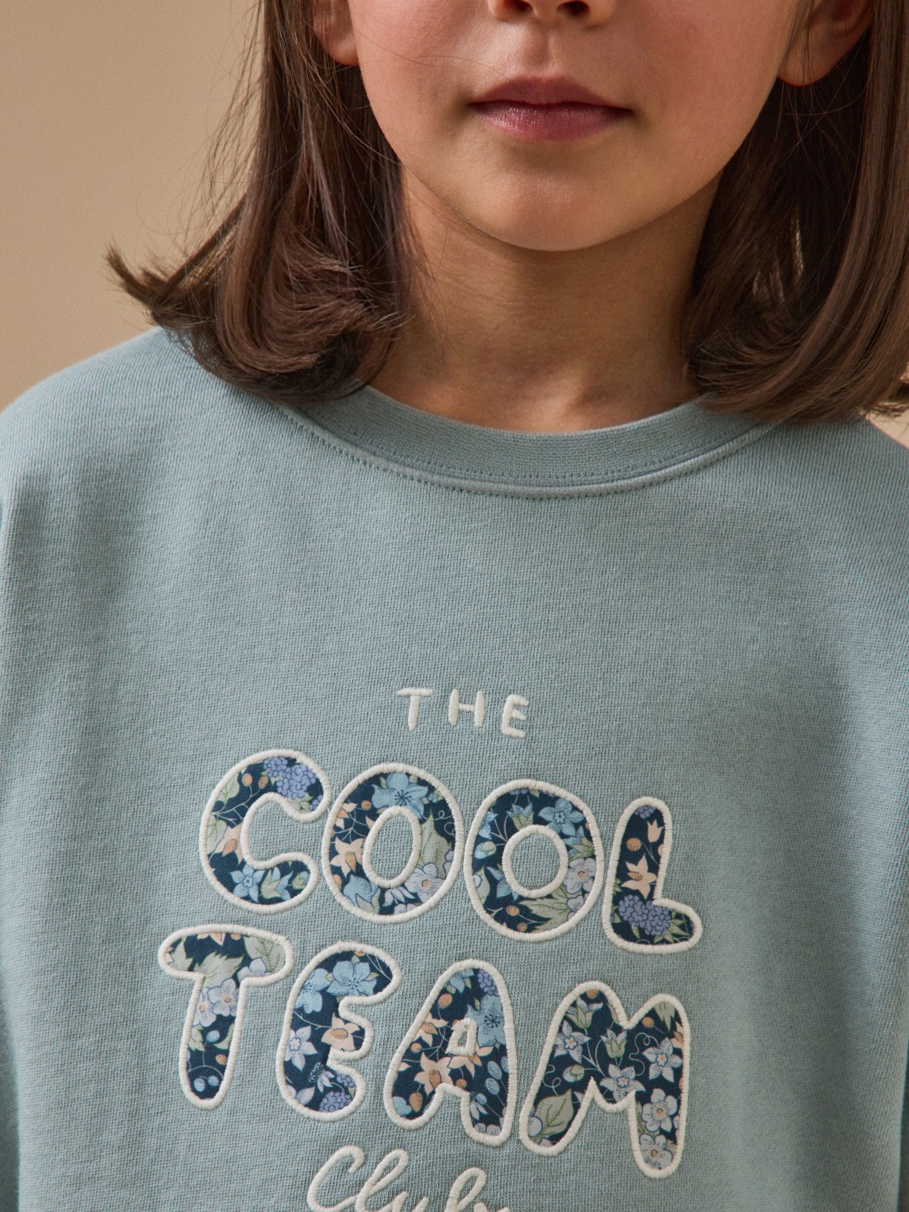 Girl's Cool Team organic cotton sweatshirt, details made with Liberty fabric