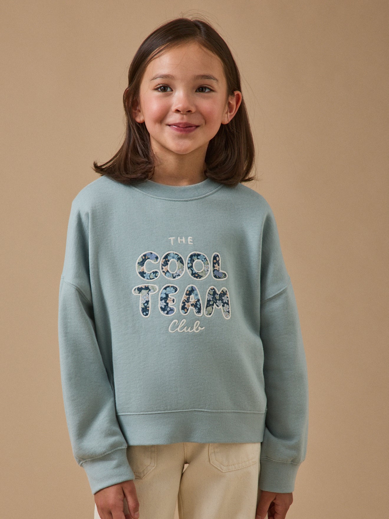 Girl's Cool Team organic cotton sweatshirt, details made with Liberty fabric