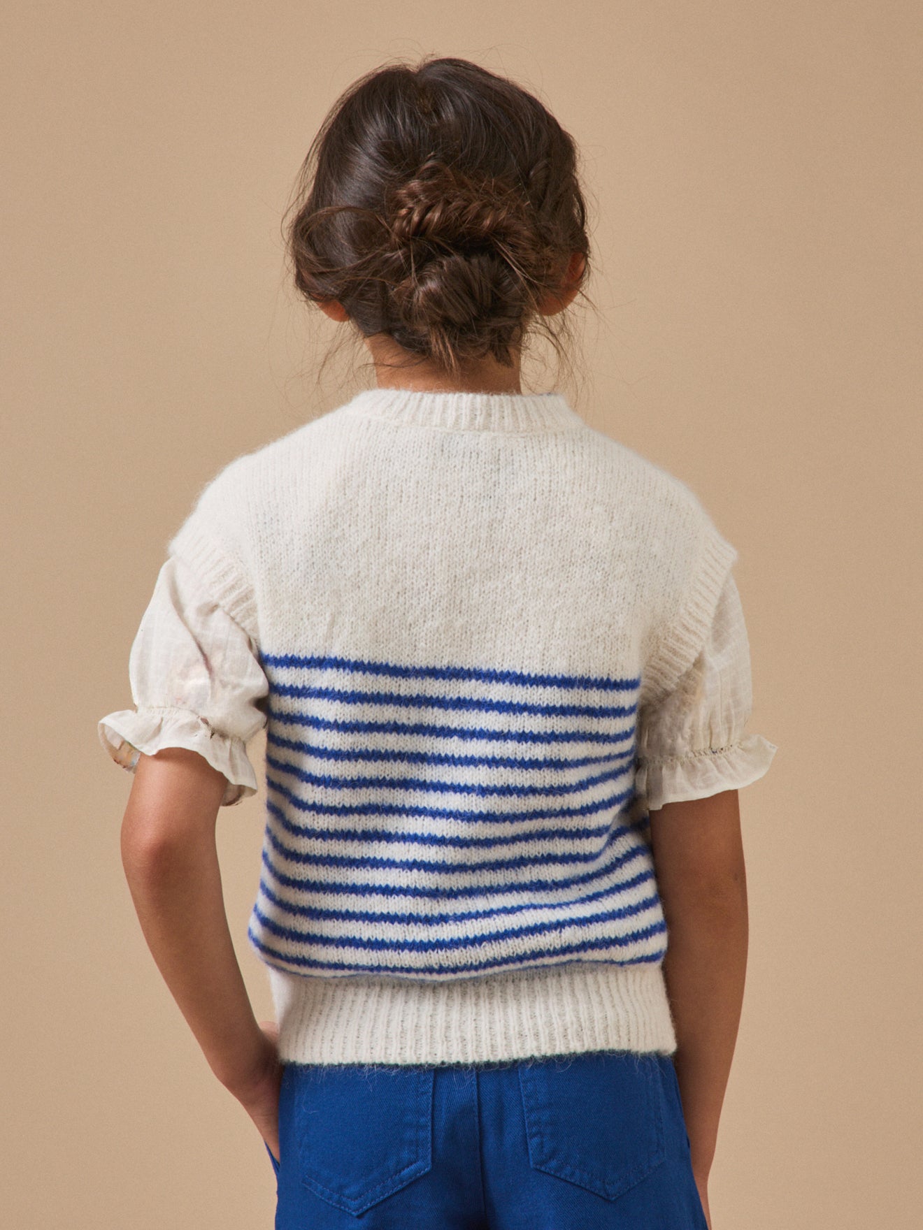 Girl's striped sleeveless sweater
