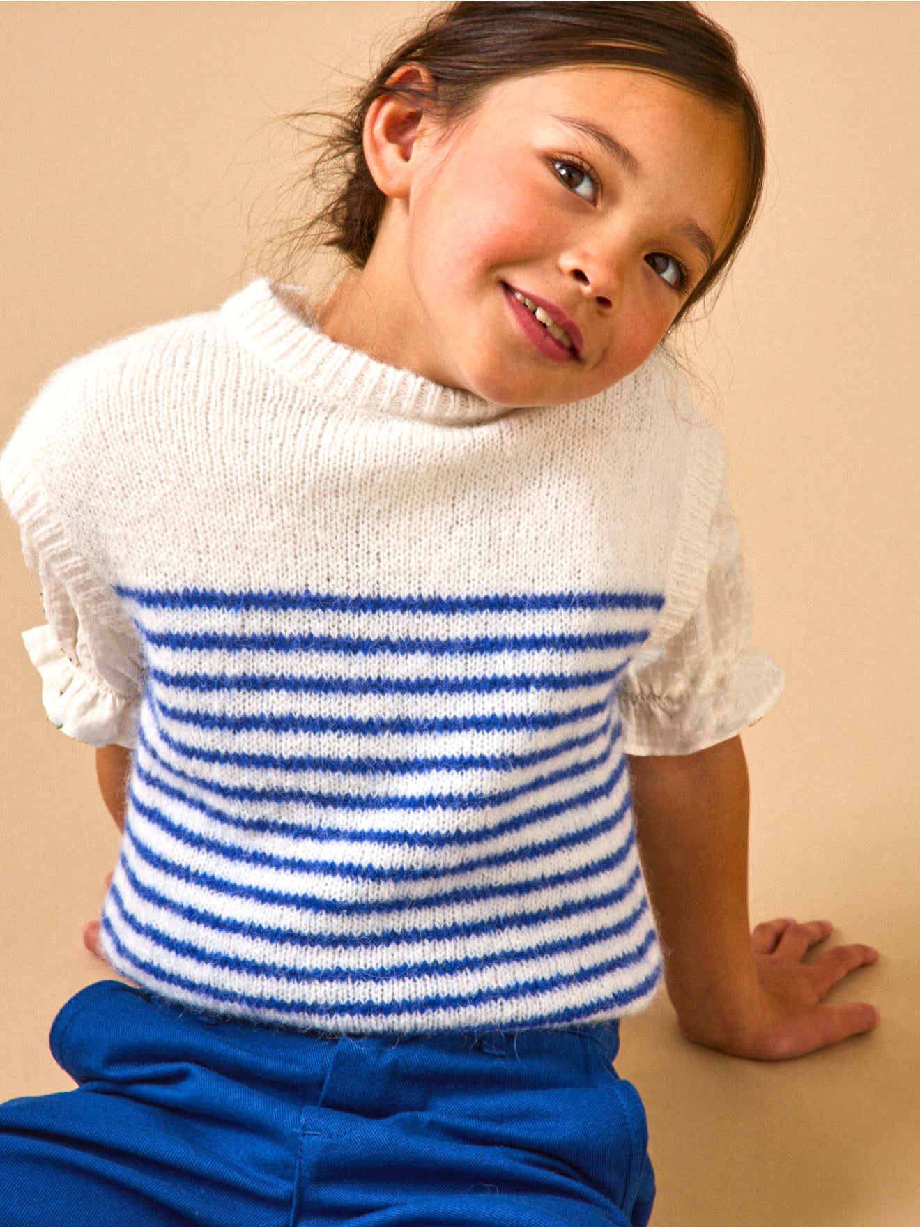Girl's striped sleeveless sweater