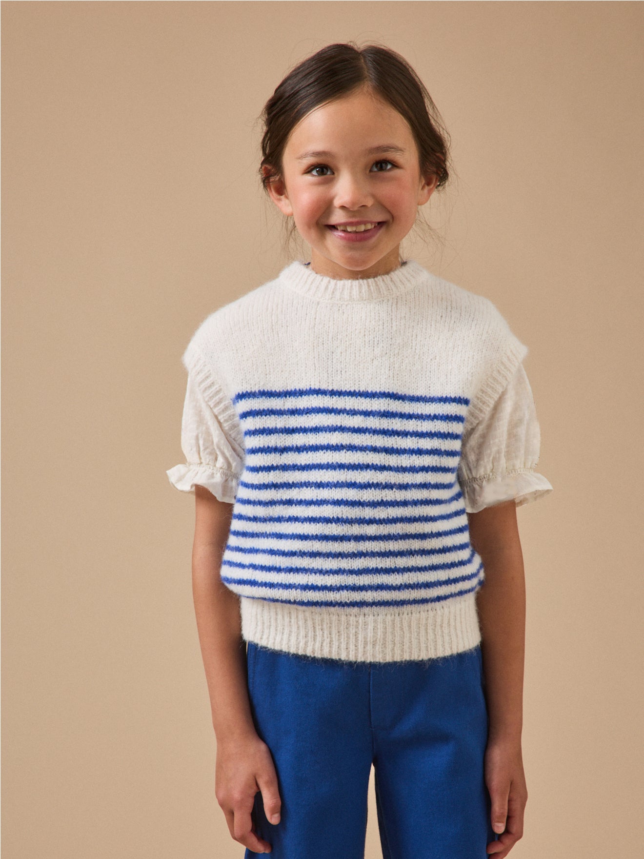 Girl's striped sleeveless sweater