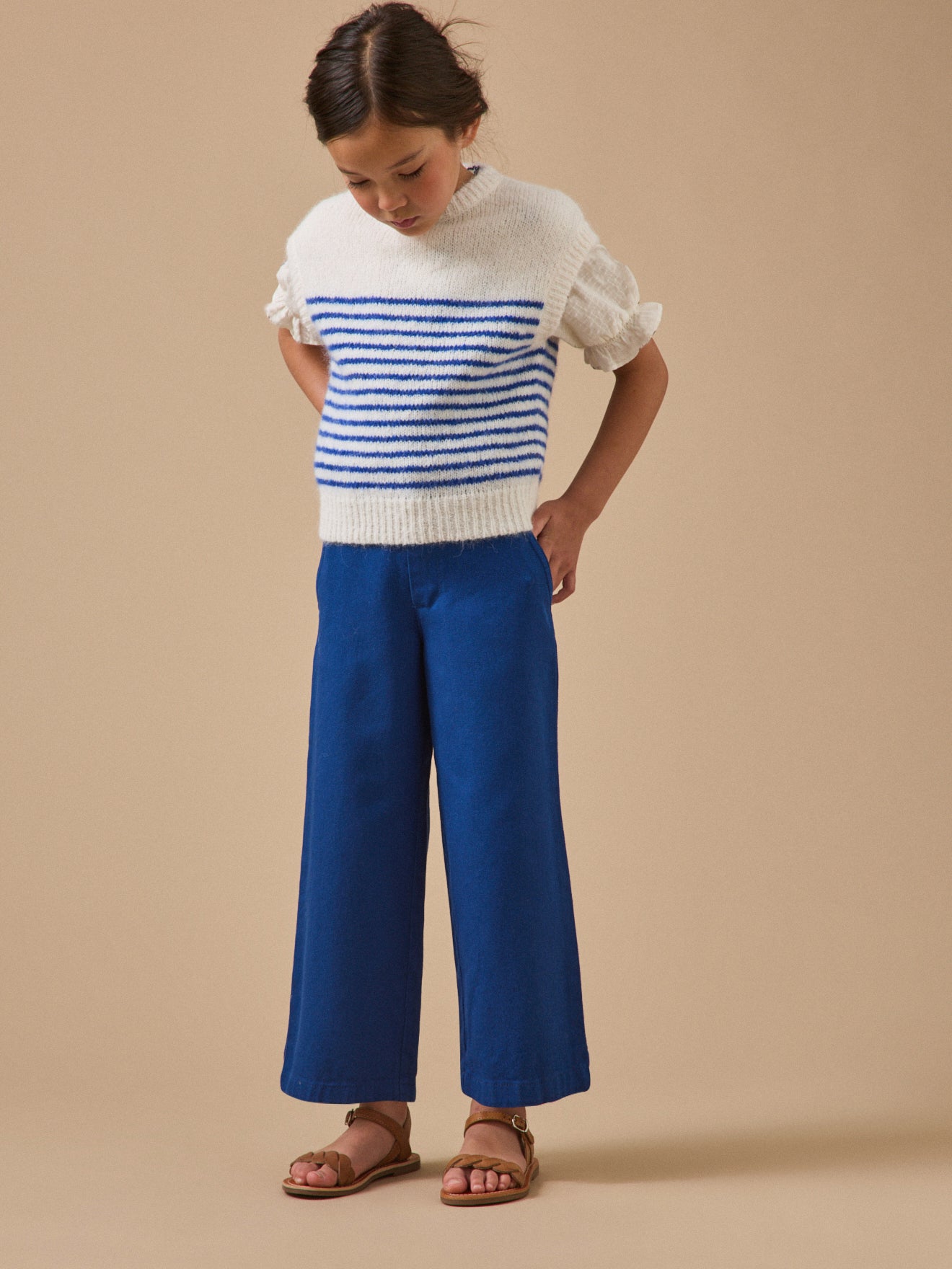Girl's striped sleeveless sweater