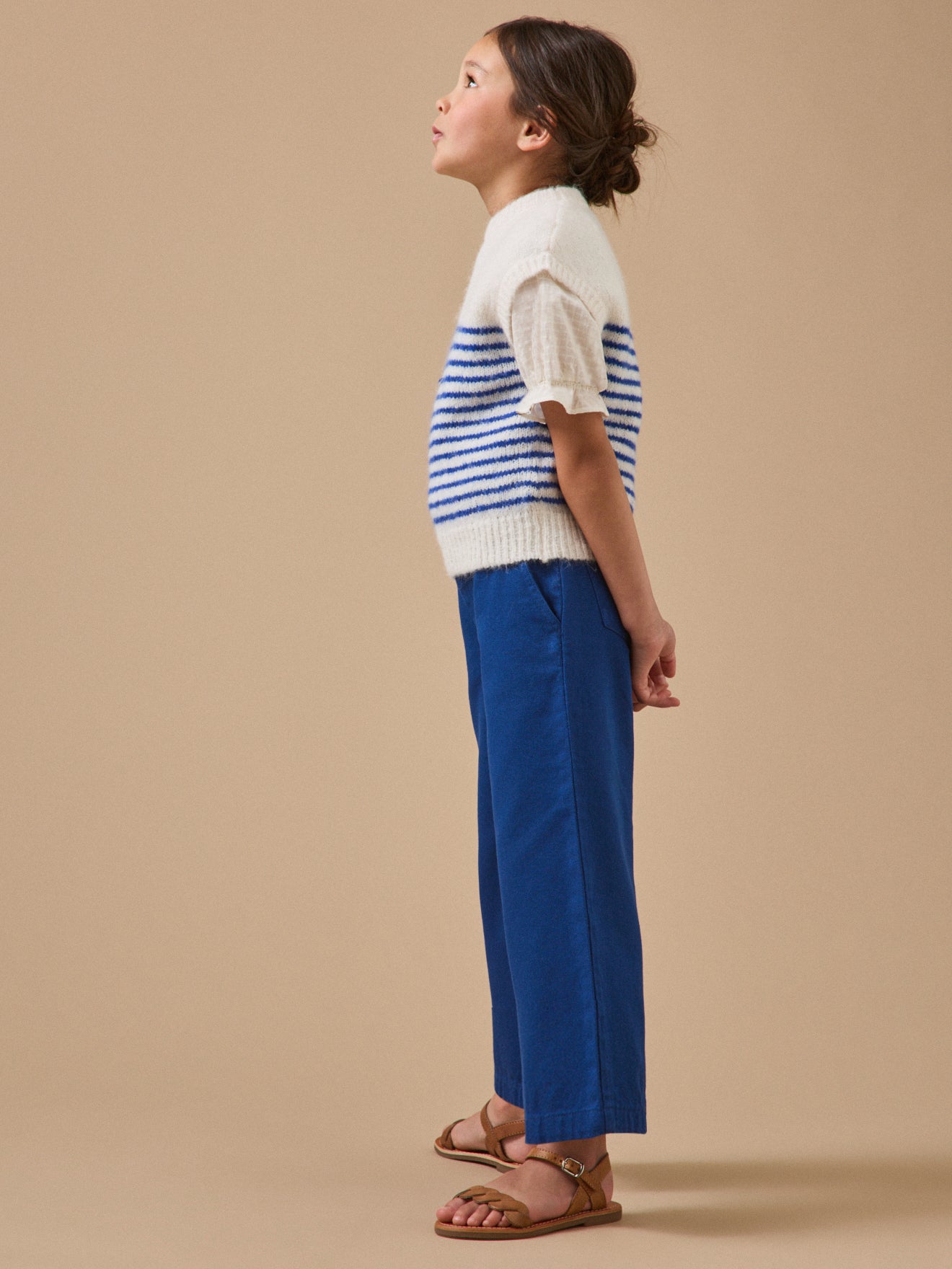 Girl's striped sleeveless sweater