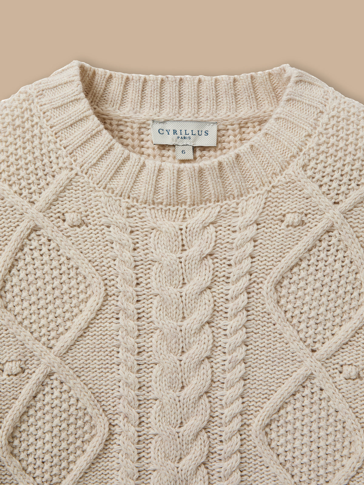 Girl's cable-knit sweater with wool