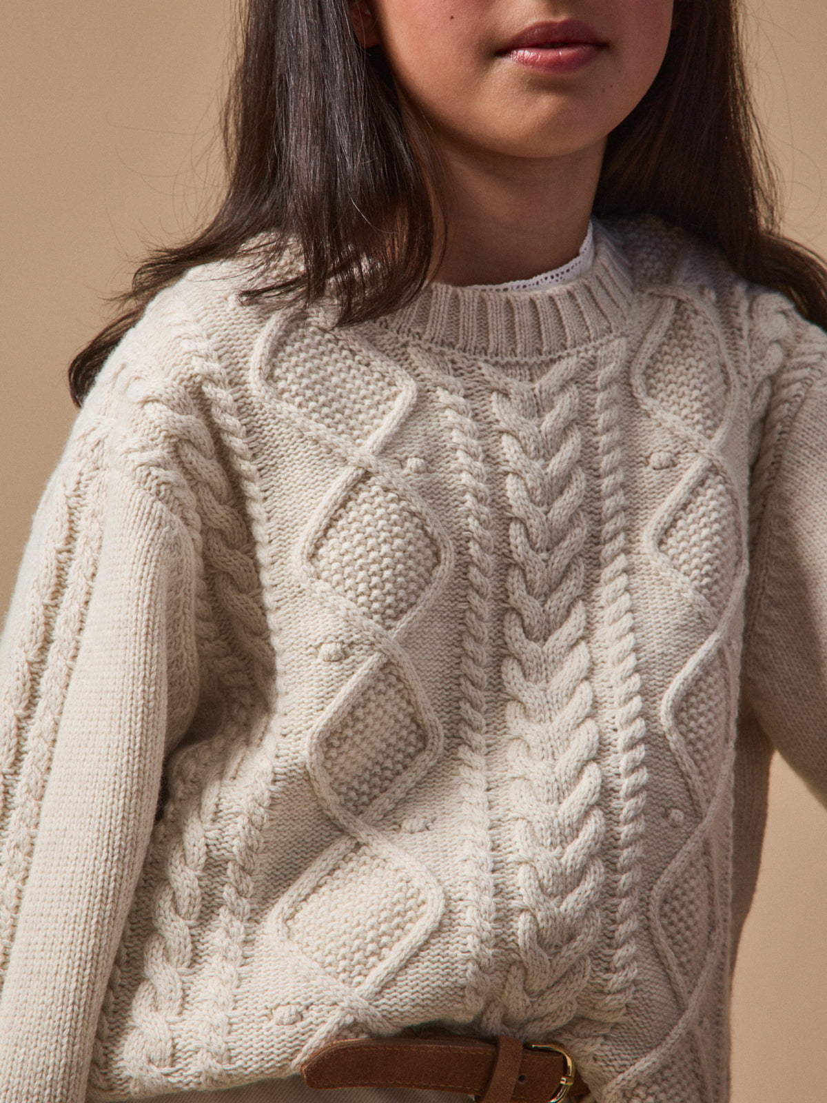 Girl's cable-knit sweater with wool