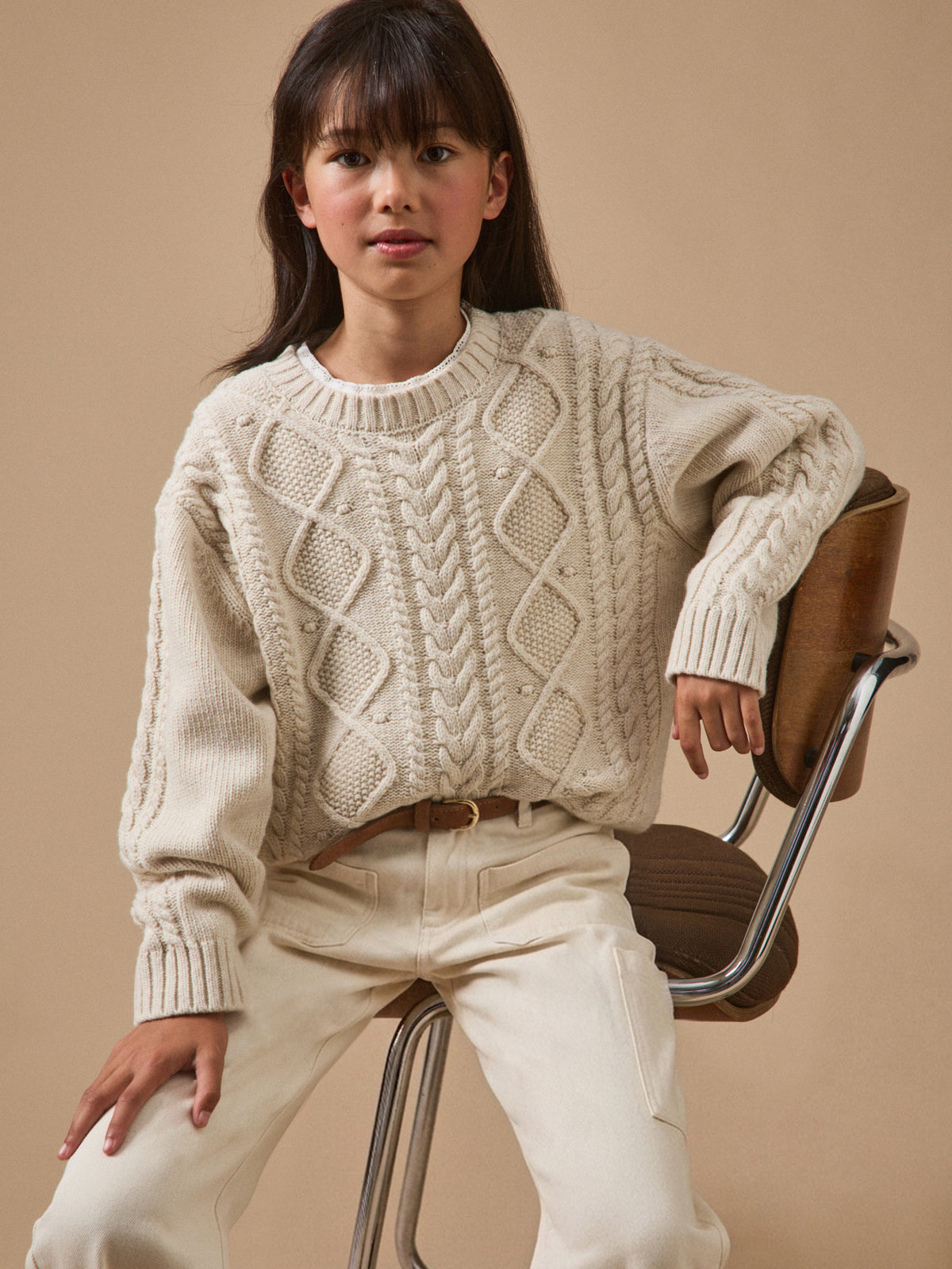 Girl's cable-knit sweater with wool