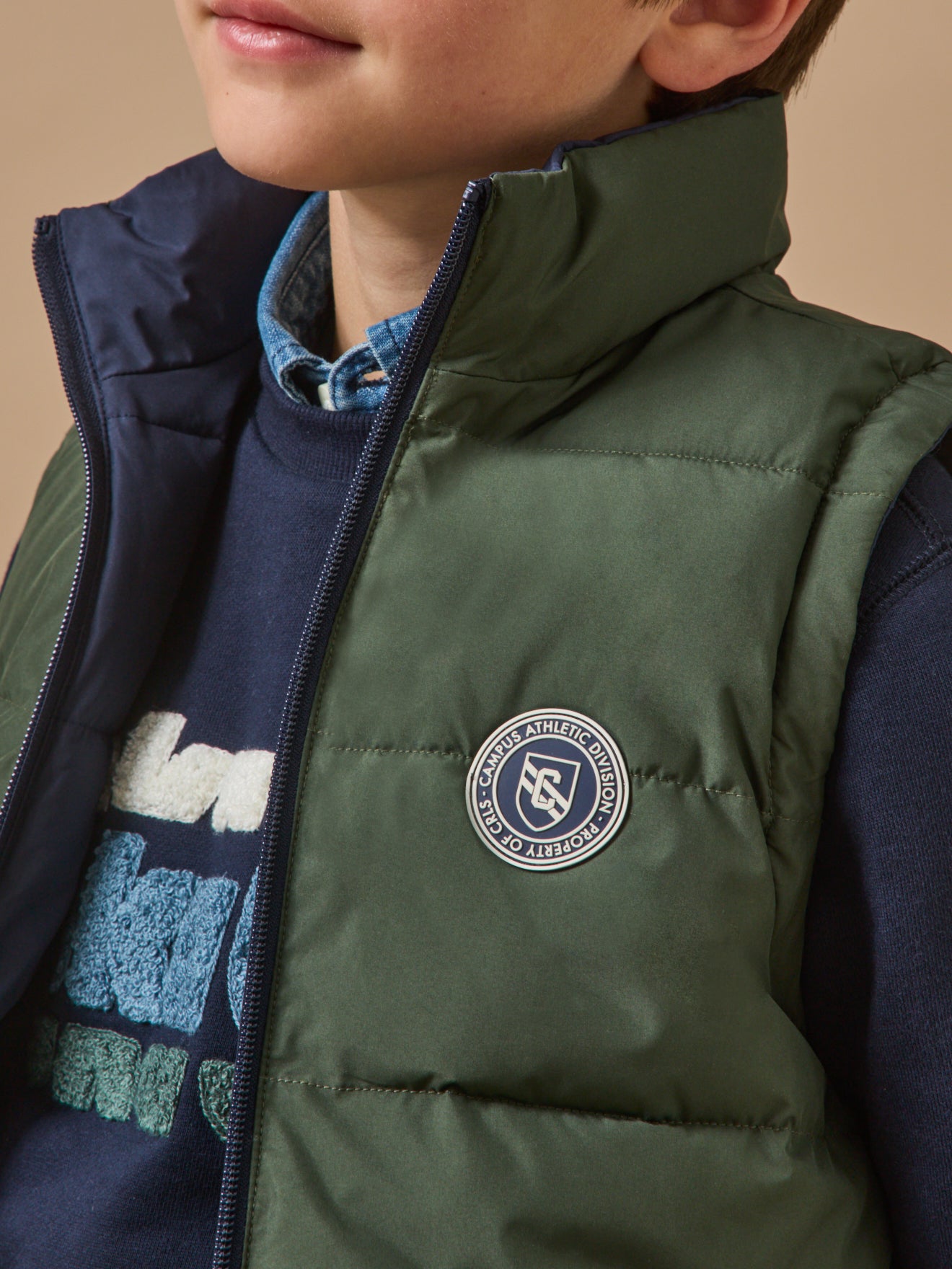 Boy's reversible sleeveless puffer jacket
