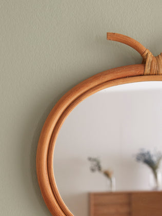Apple-shaped wicker mirror