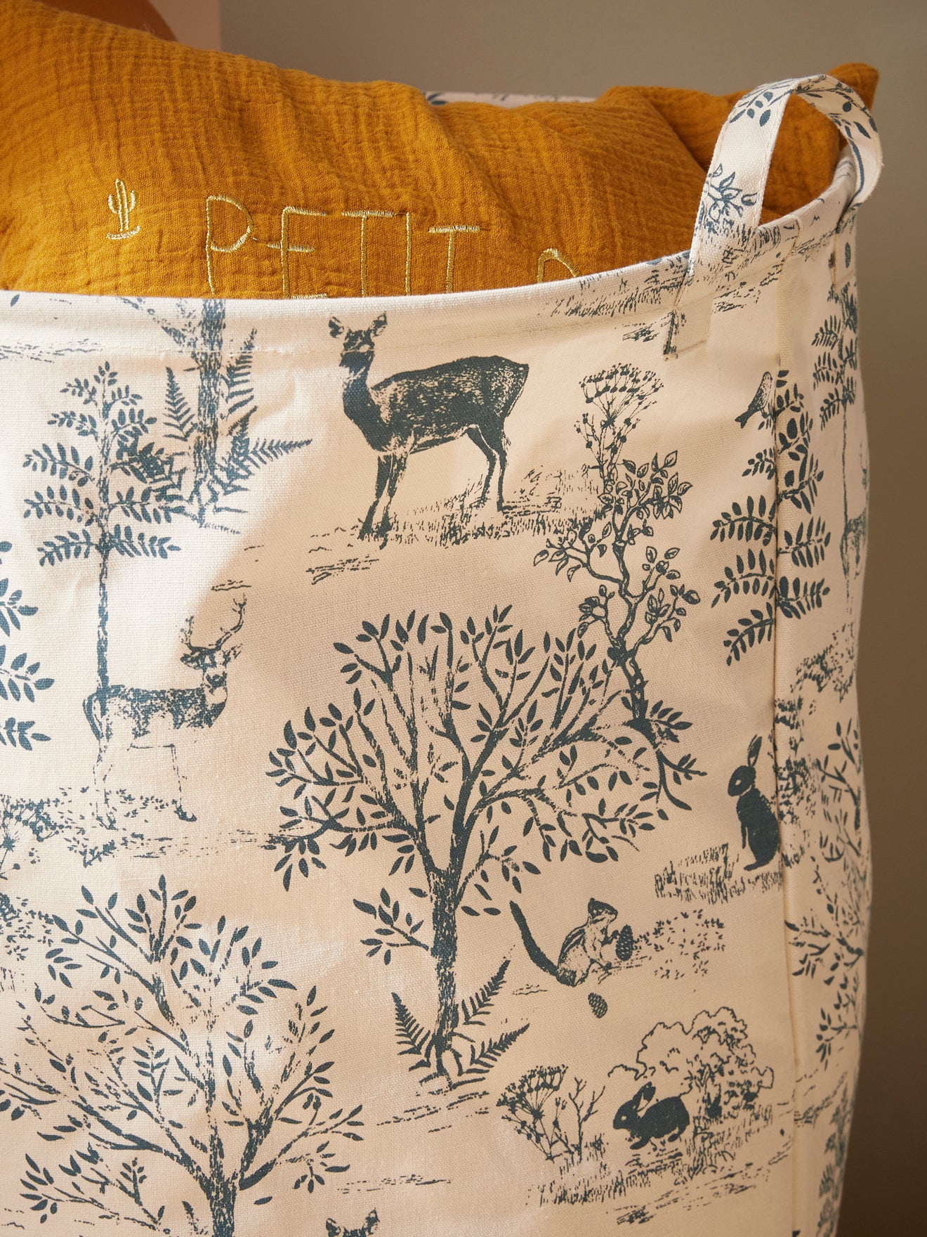 Round Toile de Jouy inspired storage basket