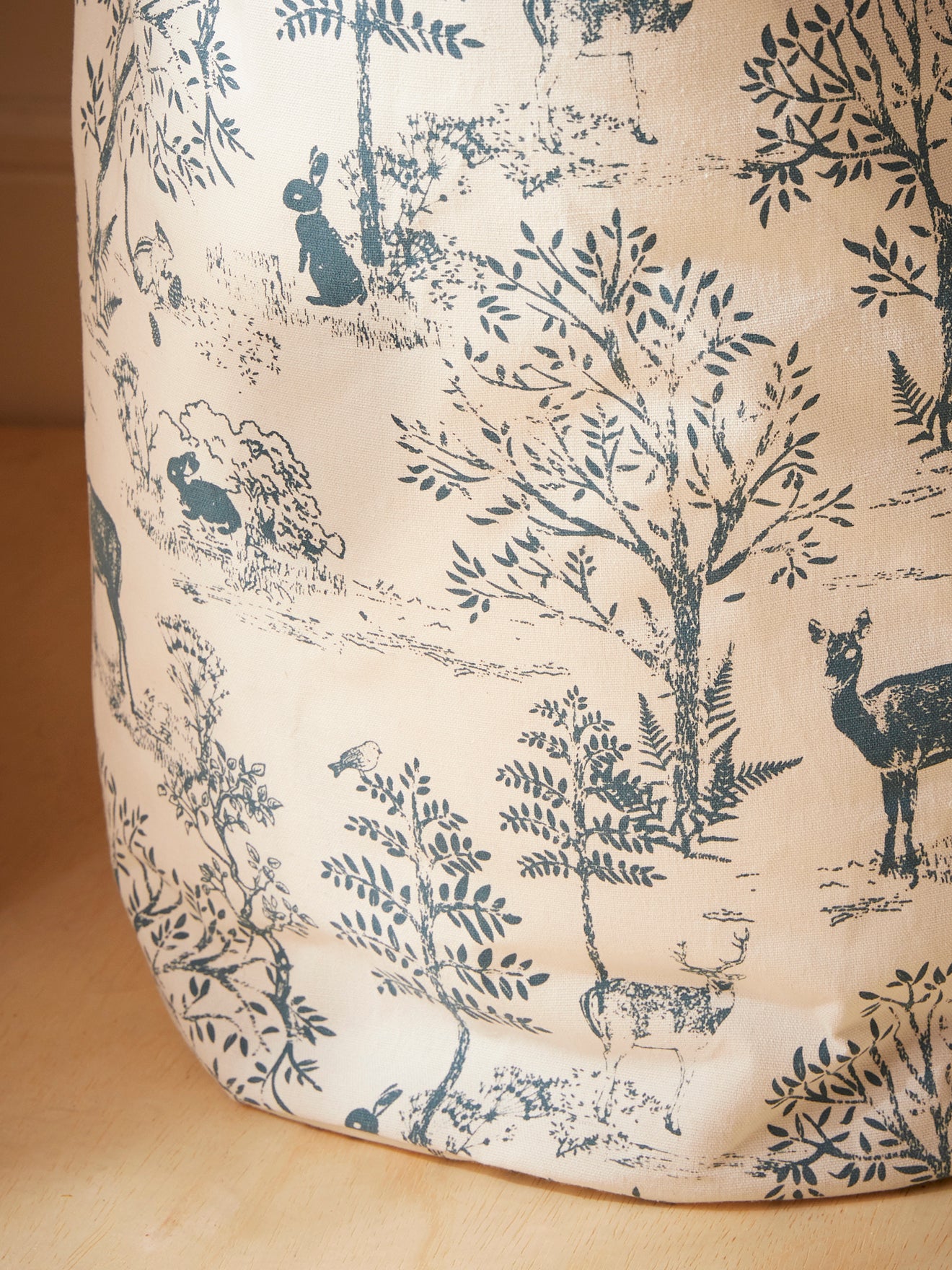 Round Toile de Jouy inspired storage basket
